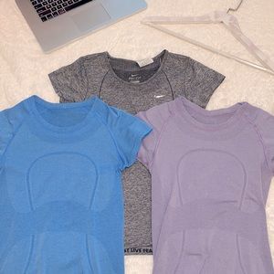2 Lululemon Shirts + 1 Nike Shirt, all fit a Small